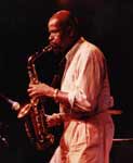 Makanda Ken McIntyre plays the alto saxophone with Charlie Haden's Liberation Music Orchestra, 1990s, photo by Cory Pearson